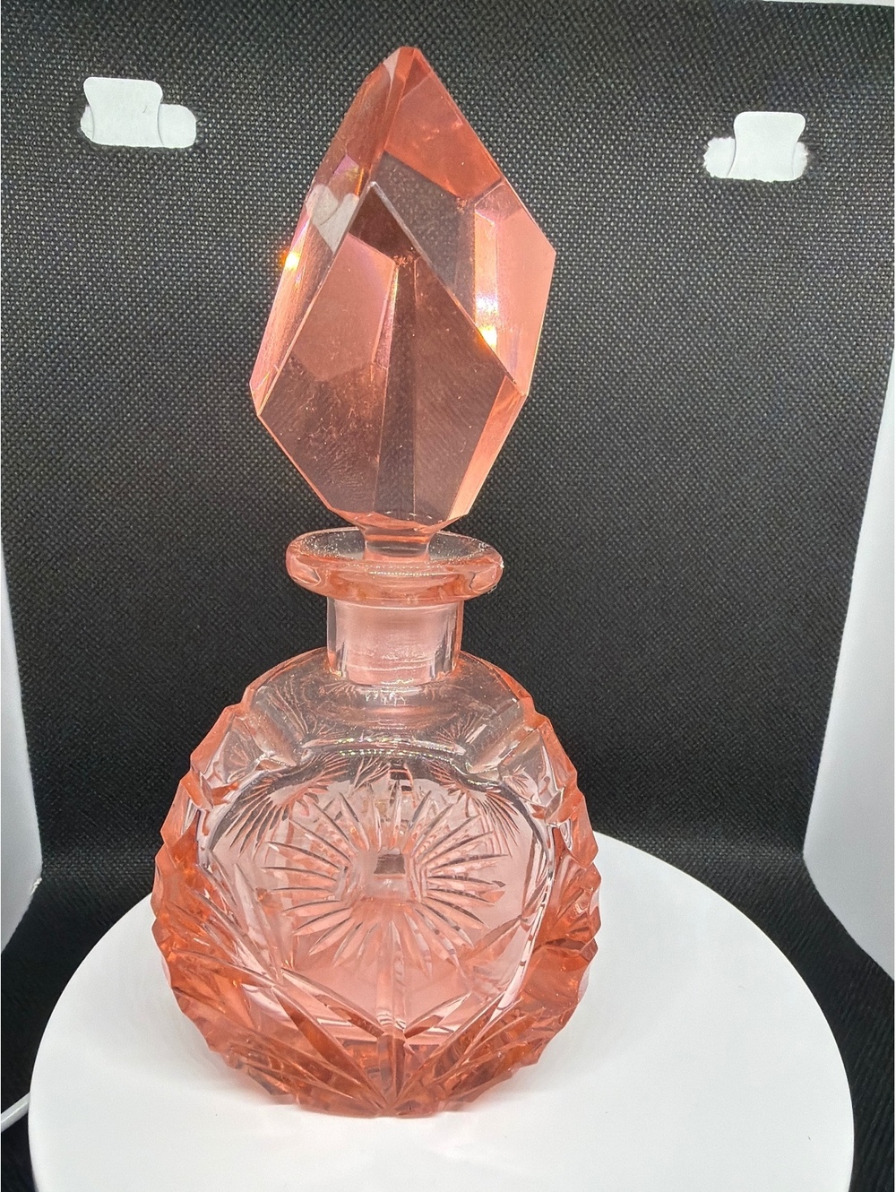 Pink cut glass decanter with stopper